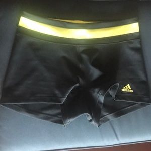 Adidas grey shorts with reflective yellow